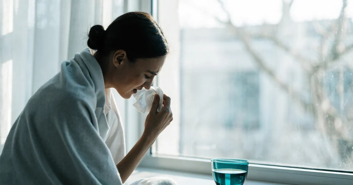 Adult with cold-like symptoms by a window – could it be an adenovirus infection?